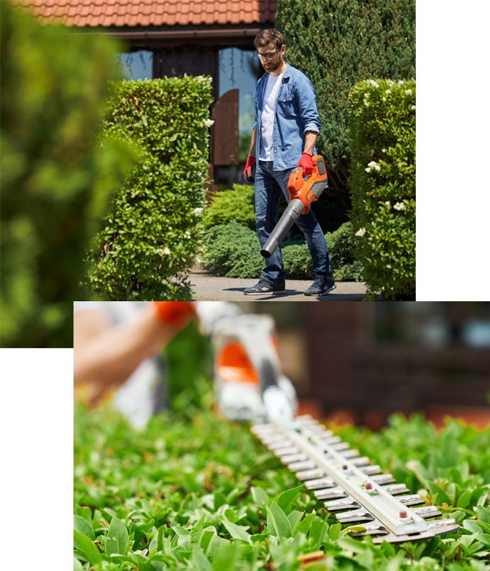 Seeded Grounds worker clearing a garden path with a leaf blower and trimming a hedge